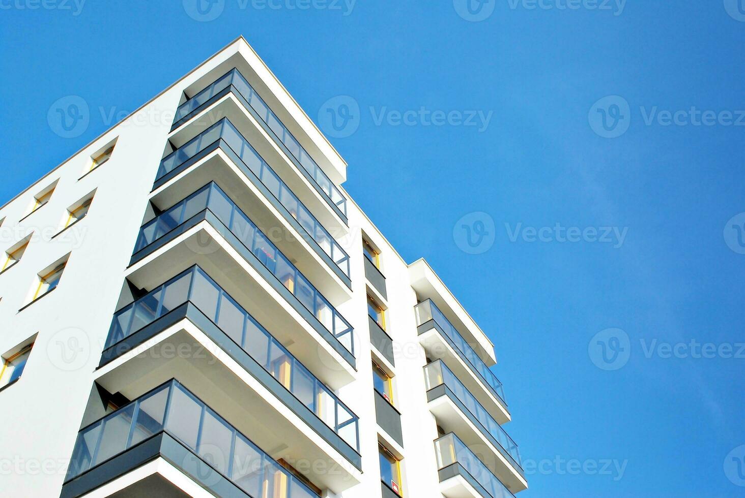 Modern and new apartment building. Multistoried, modern, new and stylish living block of flats. photo