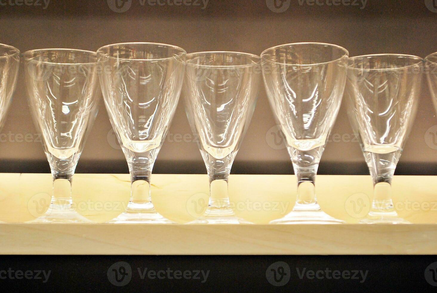 Crystal wine glasses on the table photo