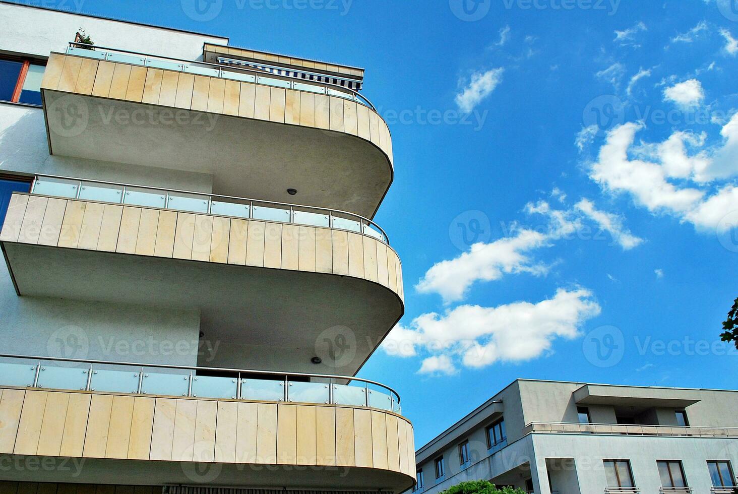 Modern and new apartment building. Multistoried, modern, new and stylish living block of flats. photo