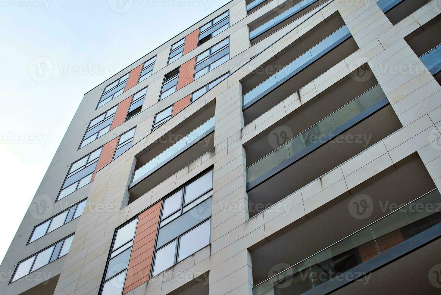 Modern and new apartment building. Multistoried, modern, new and stylish living block of flats. photo