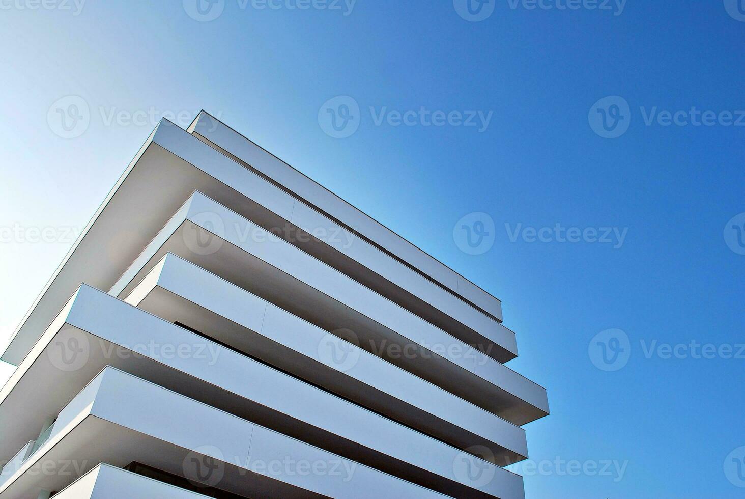 Modern and new apartment building. Multistoried, modern, new and stylish living block of flats. photo