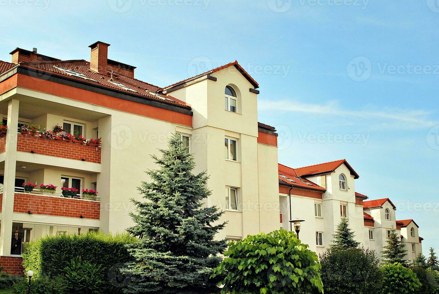 Modern and new apartment building. Multistoried, modern, new and stylish living block of flats. photo