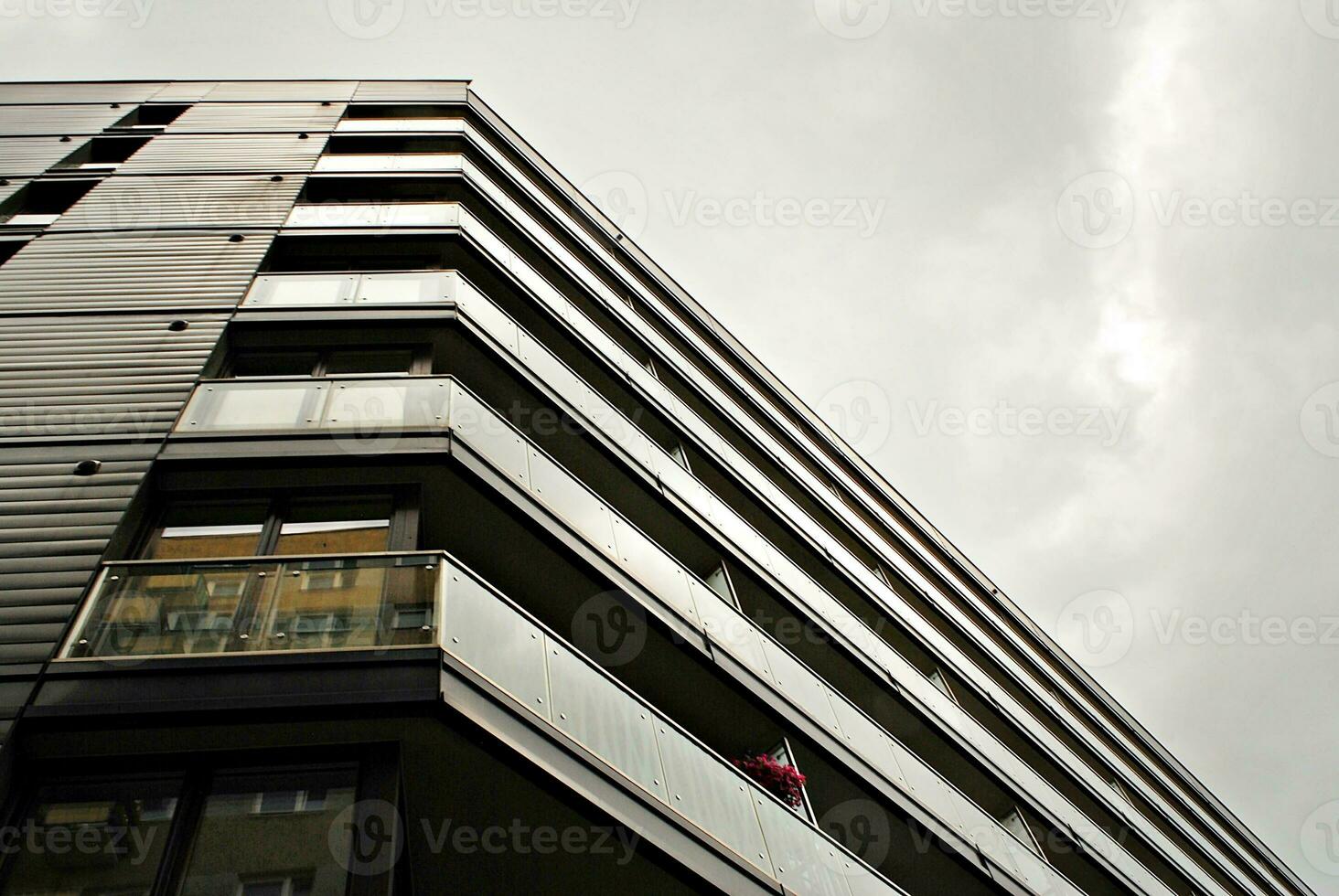 Modern and new apartment building. Multistoried, modern, new and stylish living block of flats. photo