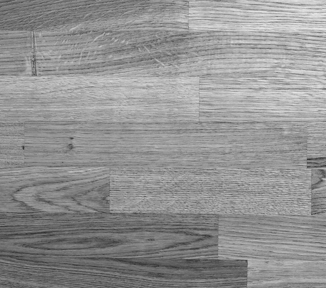 natural madera negro y blanco antecedentes con borroso elementos. monocromo de madera superficie patrón, escala de grises madera textura foto