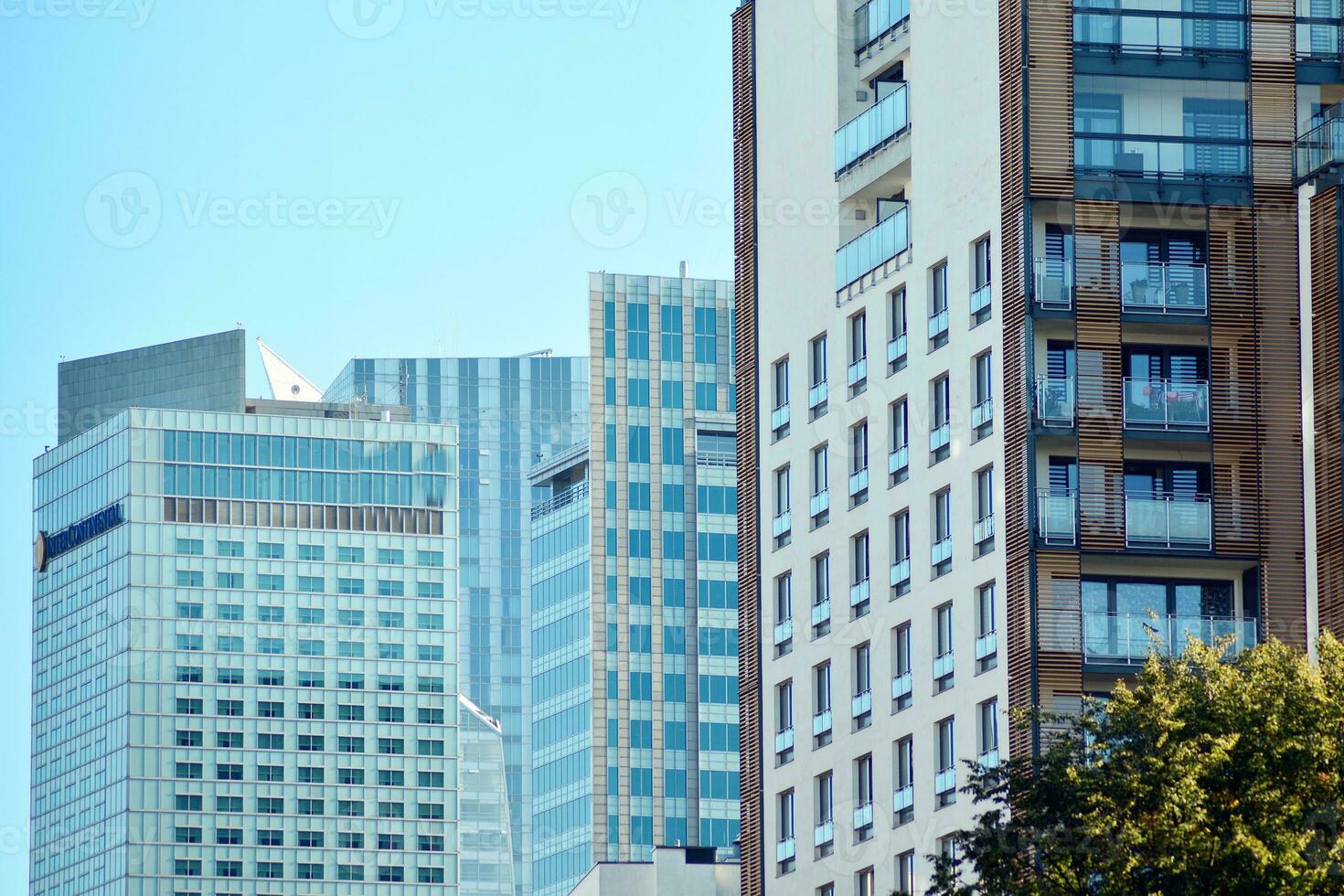 Modern and new apartment building. Multistoried, modern, new and stylish living block of flats. photo