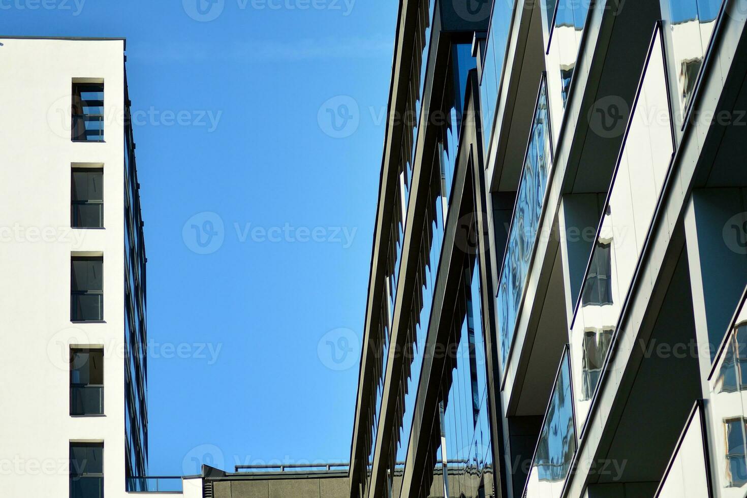 Modern and new apartment building. Multistoried, modern, new and stylish living block of flats. photo