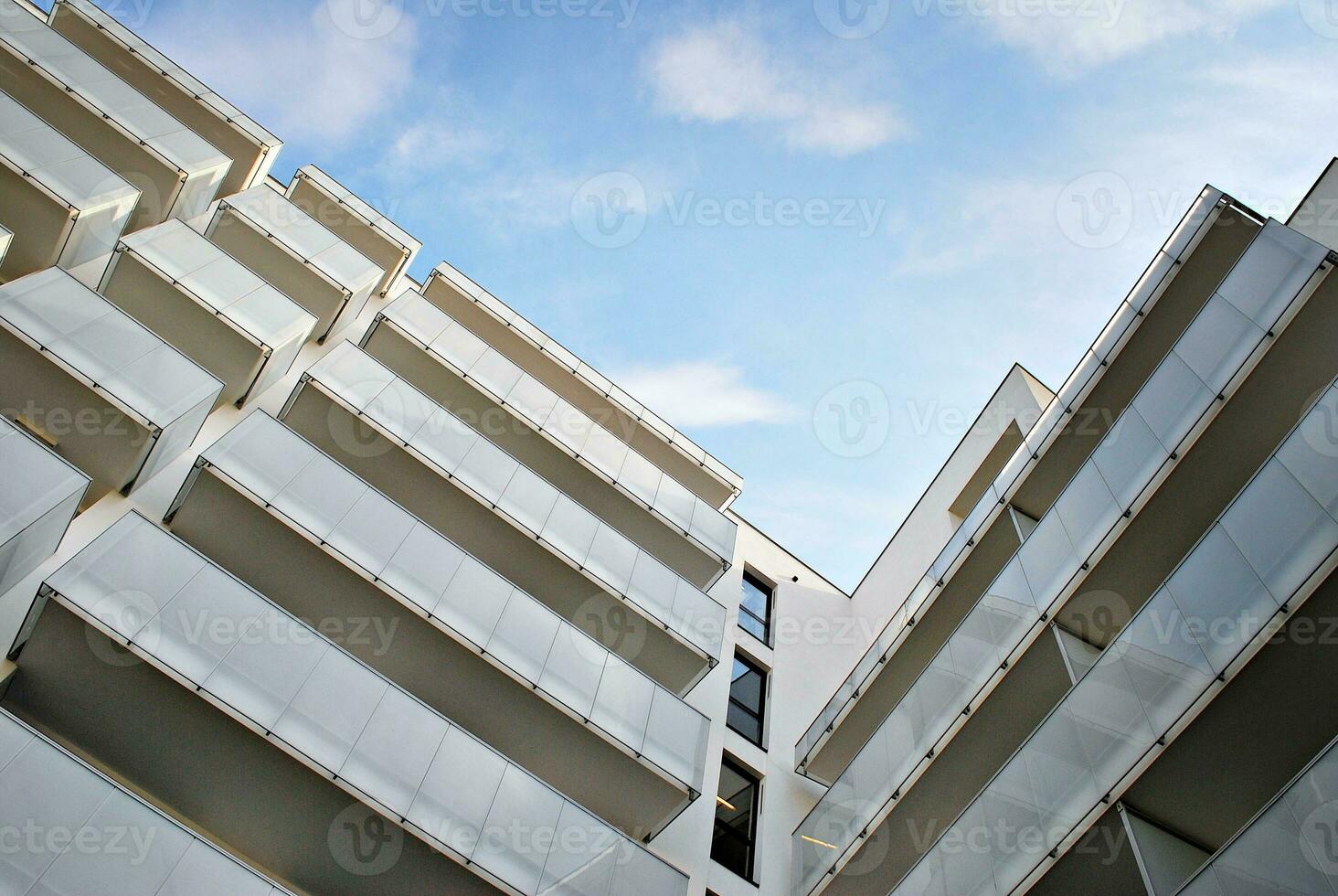 Modern and new apartment building. Multistoried, modern, new and stylish living block of flats. photo