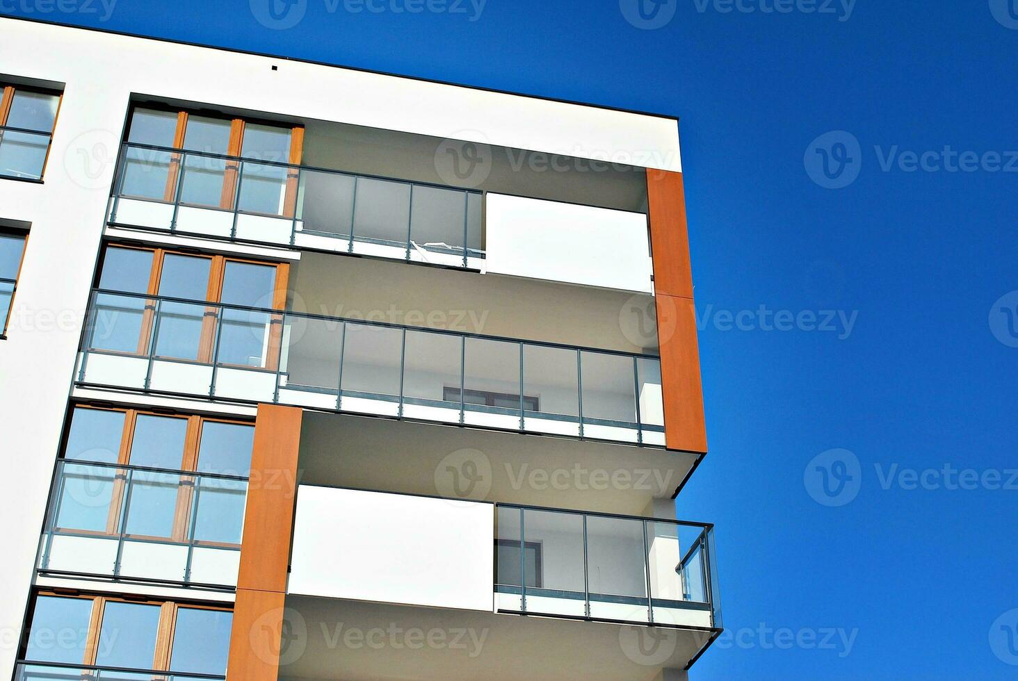 Modern and new apartment building. Multistoried, modern, new and stylish living block of flats. photo