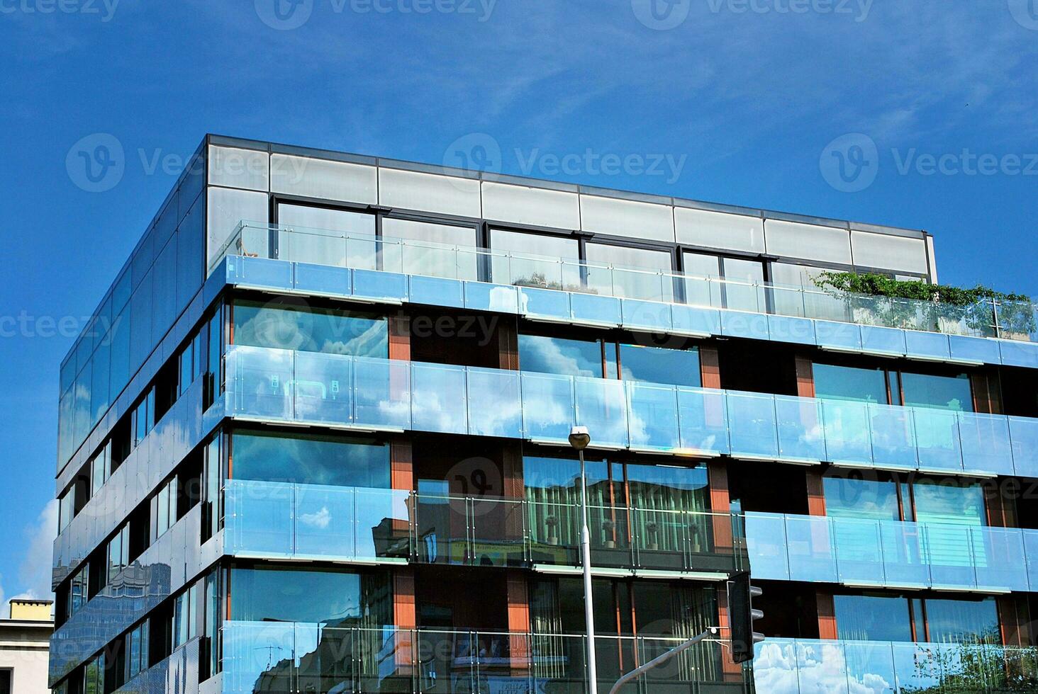 Modern and new apartment building. Multistoried, modern, new and stylish living block of flats. photo