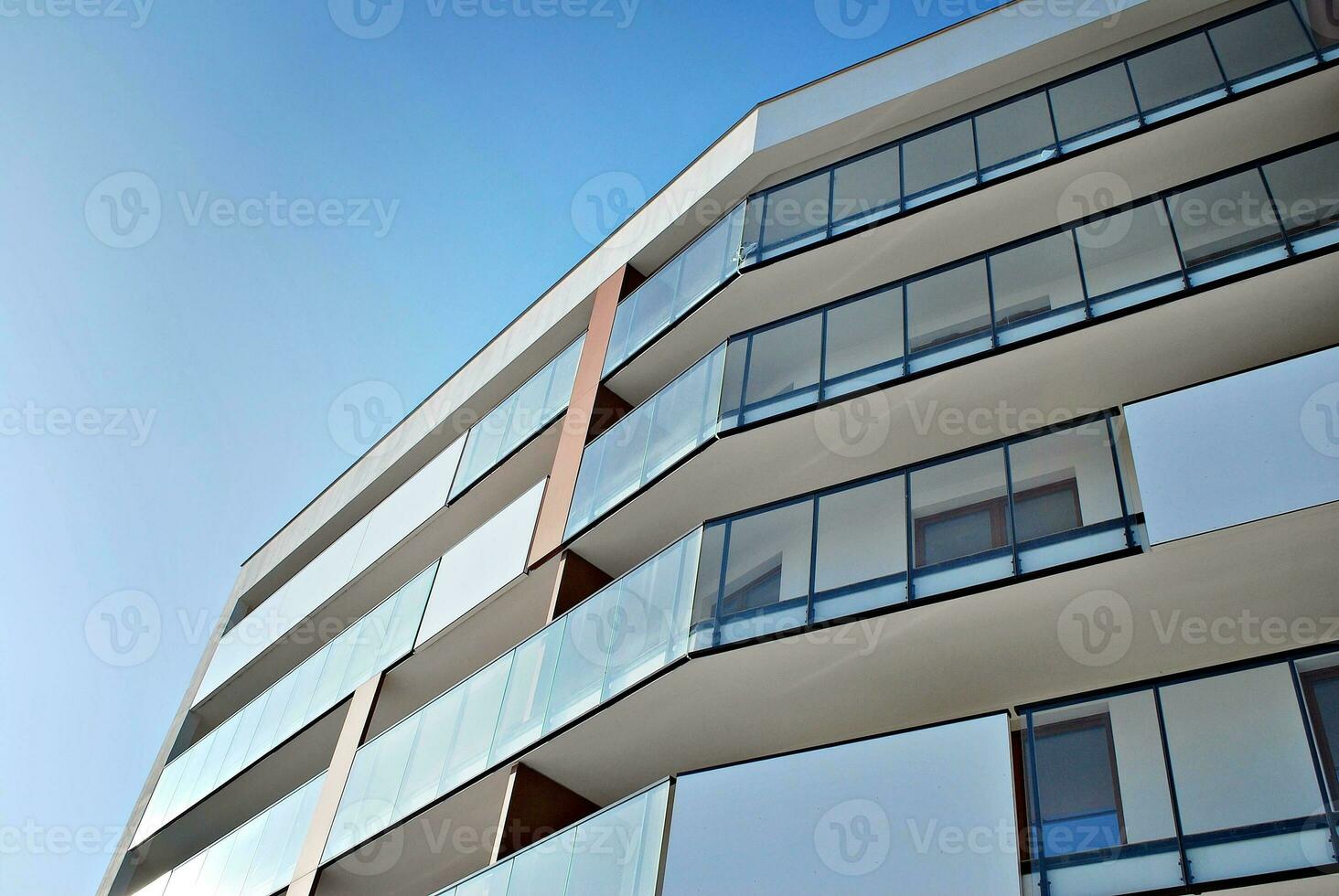 Modern and new apartment building. Multistoried, modern, new and stylish living block of flats. photo