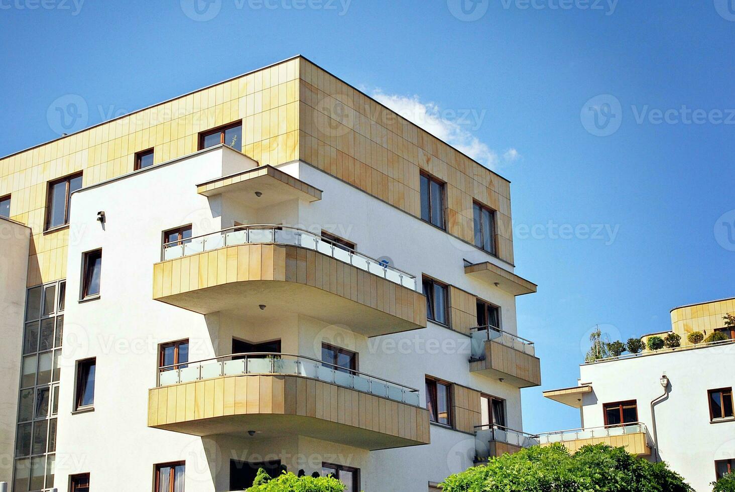 Modern and new apartment building. Multistoried, modern, new and stylish living block of flats. photo