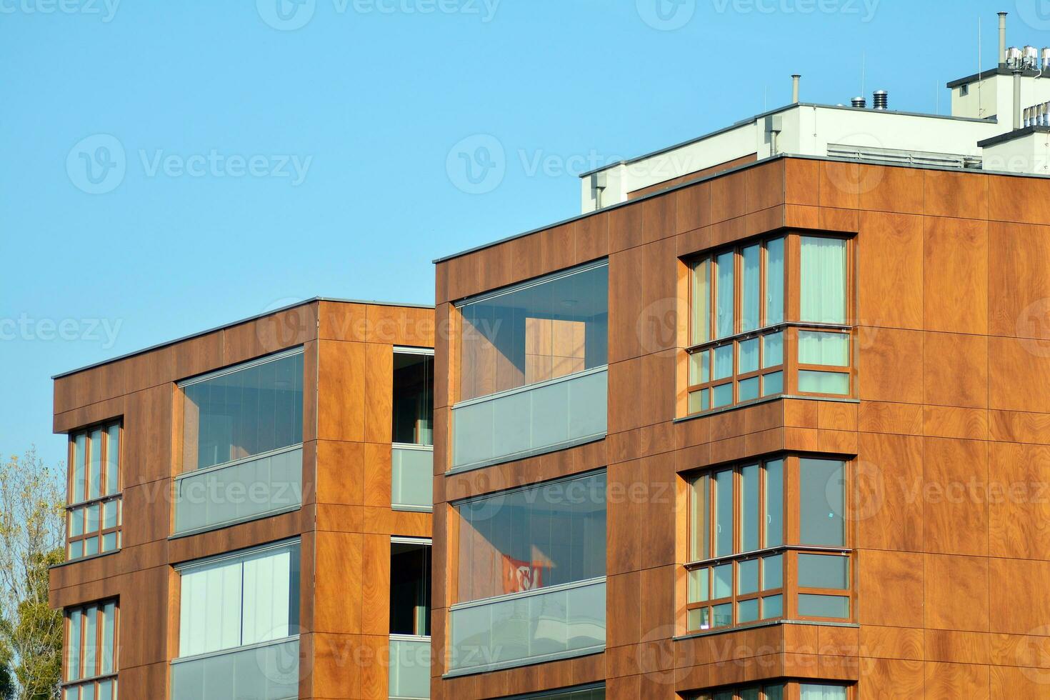 Modern and new apartment building. Multistoried, modern, new and stylish living block of flats. photo