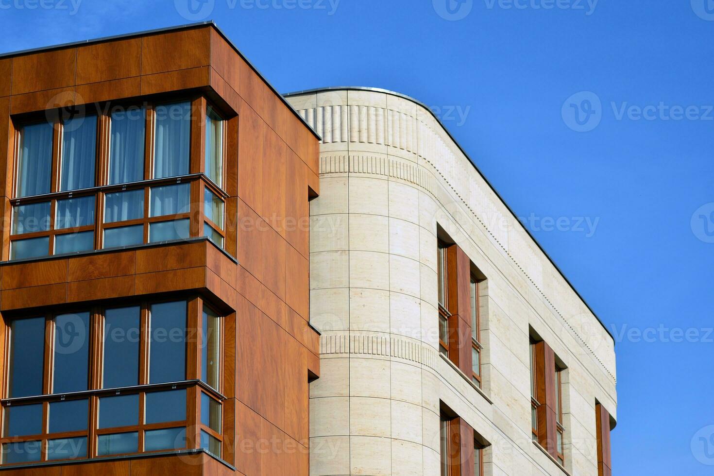 Modern and new apartment building. Multistoried, modern, new and stylish living block of flats. photo