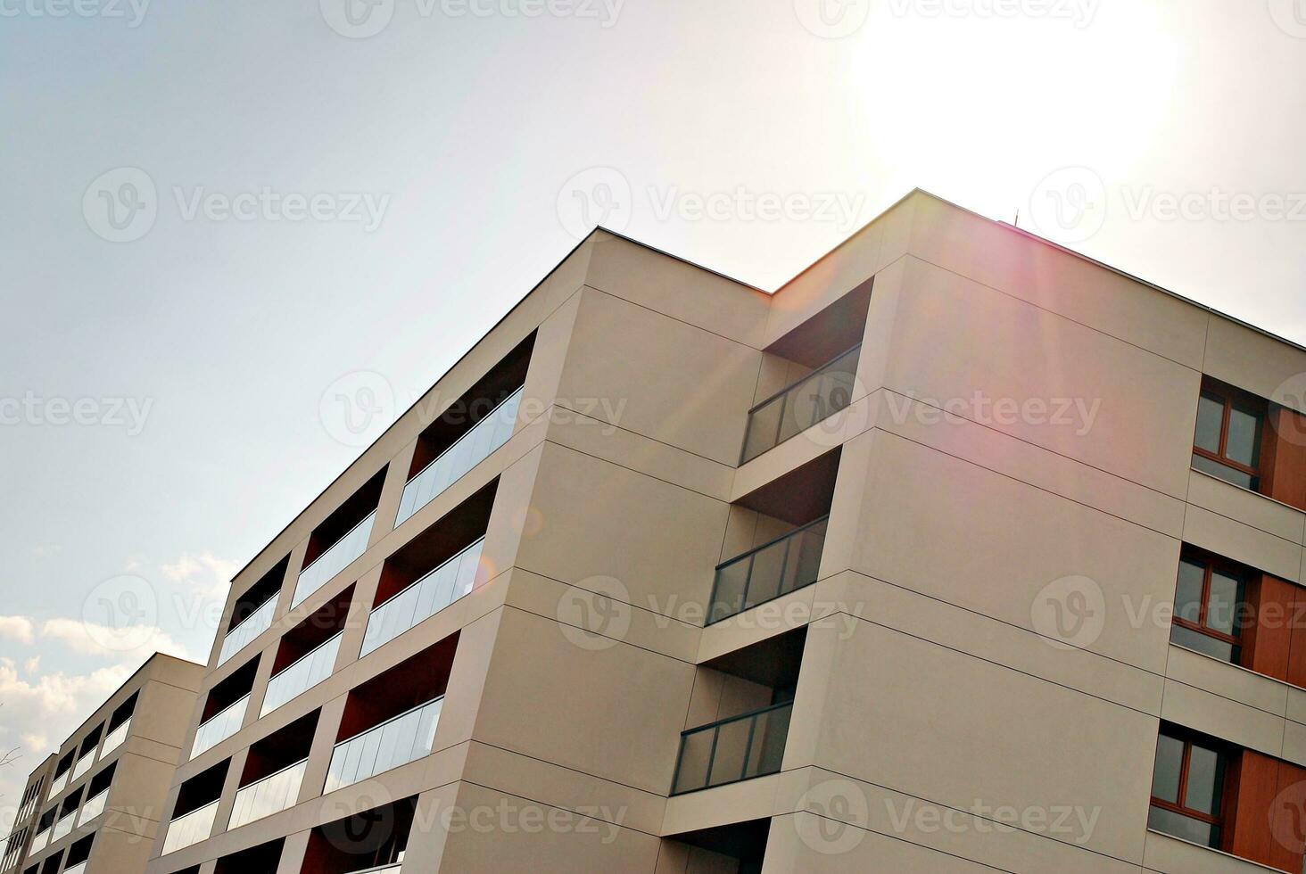 Modern and new apartment building. Multistoried, modern, new and stylish living block of flats. photo