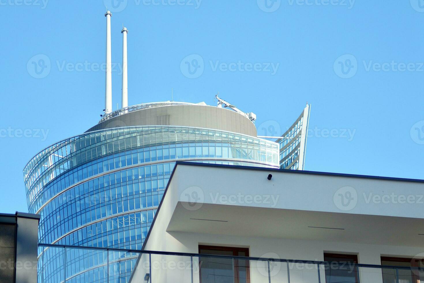 Modern and new apartment building. Multistoried, modern, new and stylish living block of flats. photo