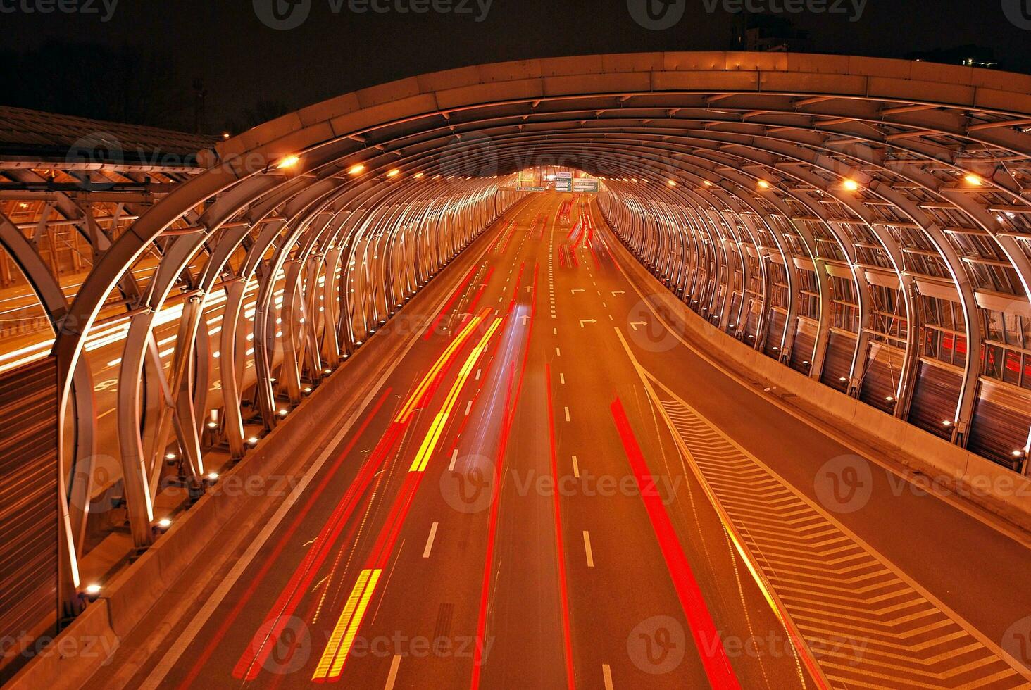 Cars on street. City street lights at night. photo