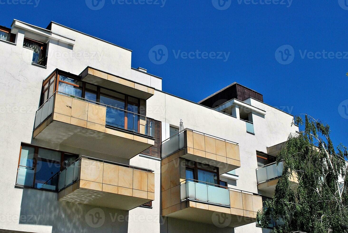 Modern and new apartment building. Multistoried, modern, new and stylish living block of flats. photo