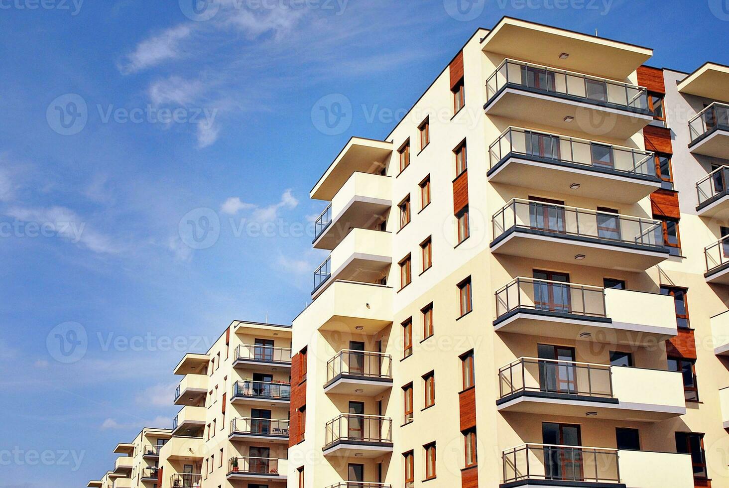 Modern and new apartment building. Multistoried, modern, new and stylish living block of flats. photo