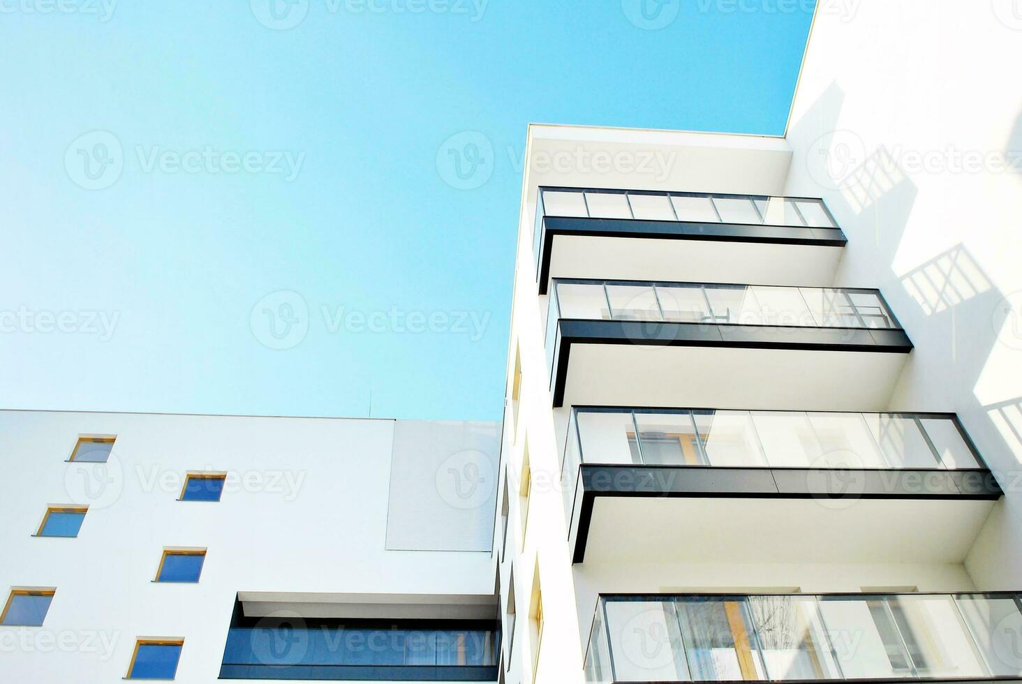 Modern and new apartment building. Multistoried, modern, new and stylish living block of flats. photo