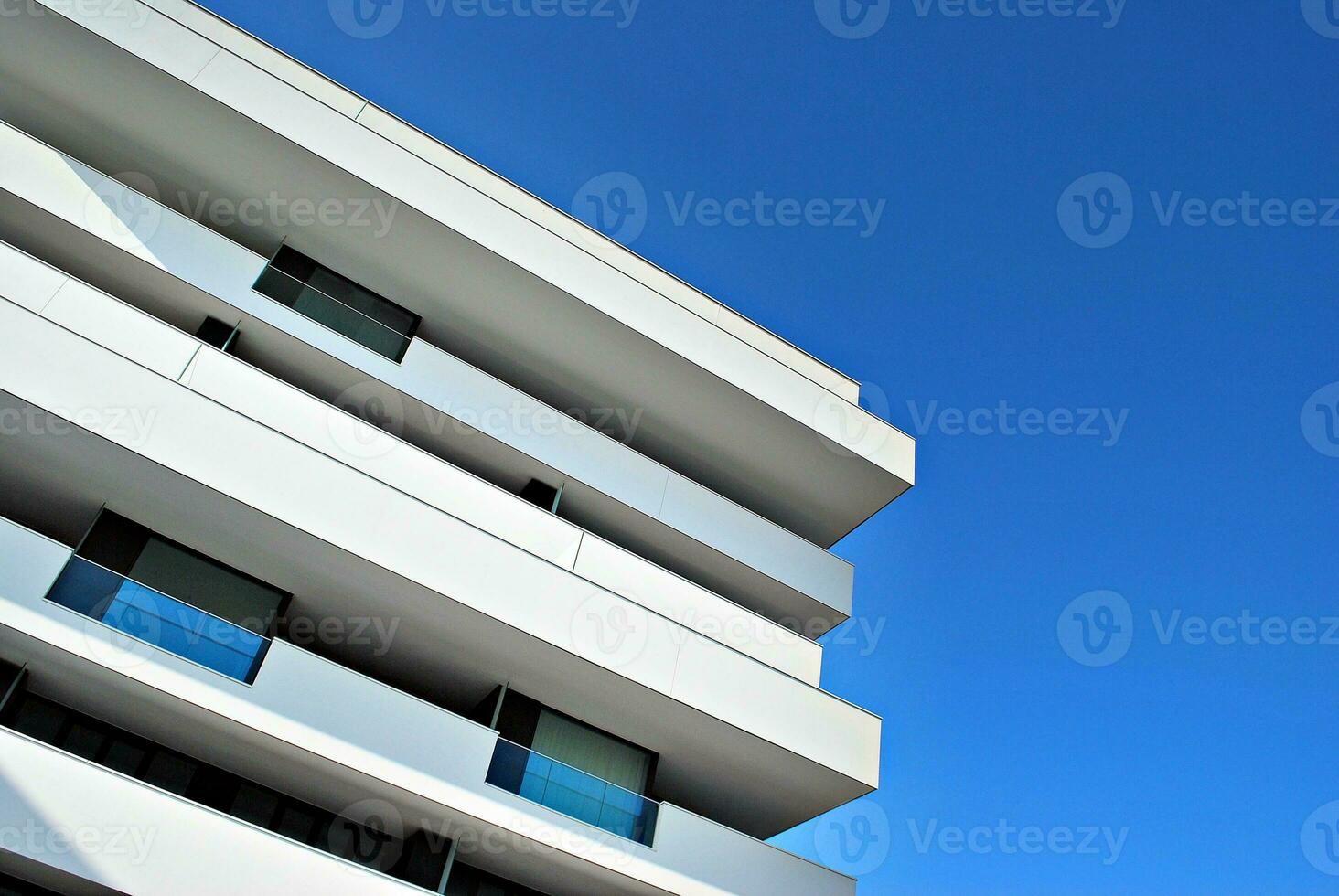 Modern and new apartment building. Multistoried, modern, new and stylish living block of flats. photo