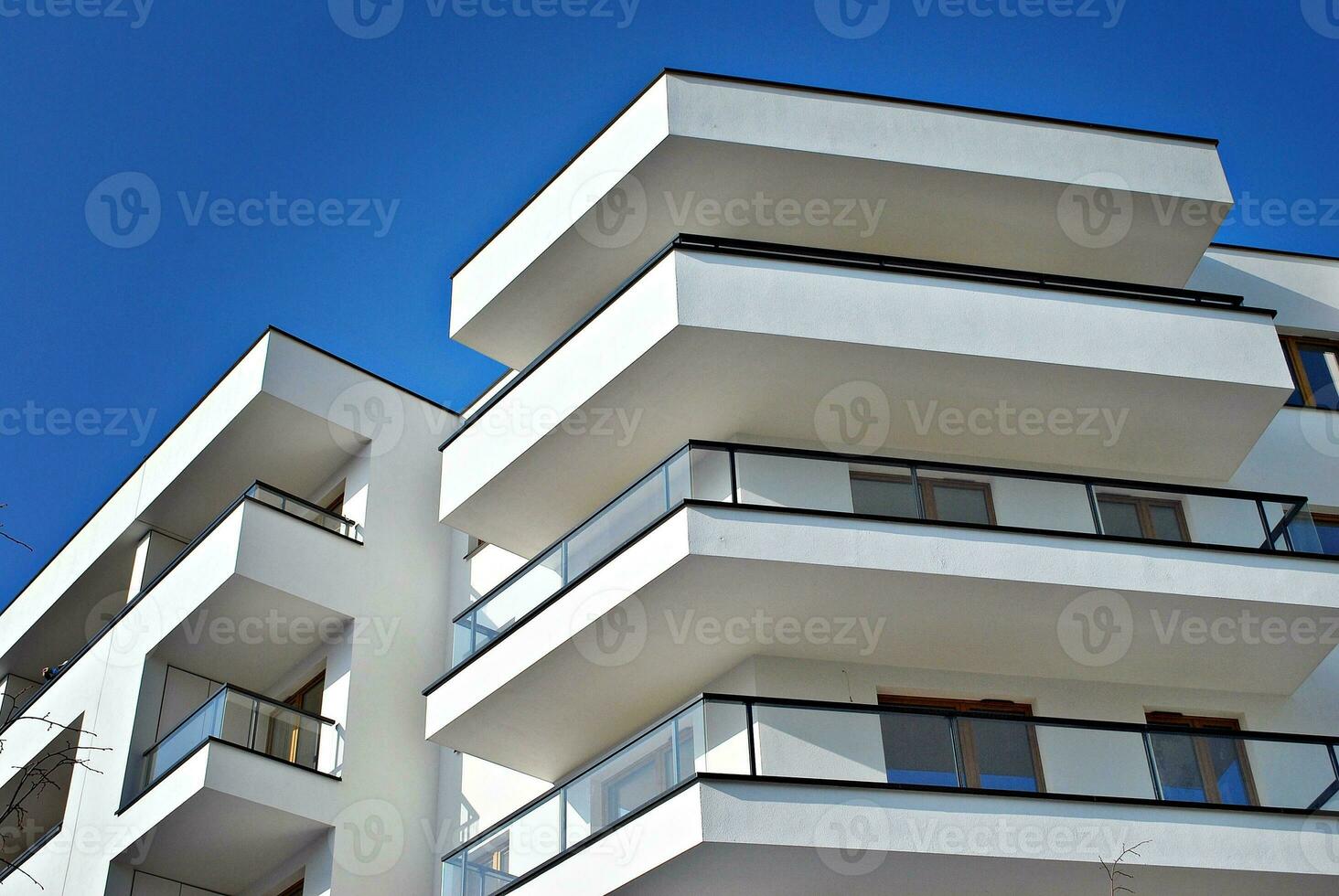 Modern and new apartment building. Multistoried, modern, new and stylish living block of flats. photo