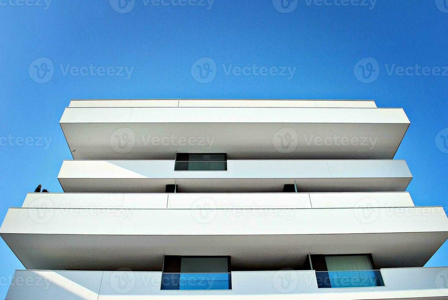 Modern and new apartment building. Multistoried, modern, new and stylish living block of flats. photo