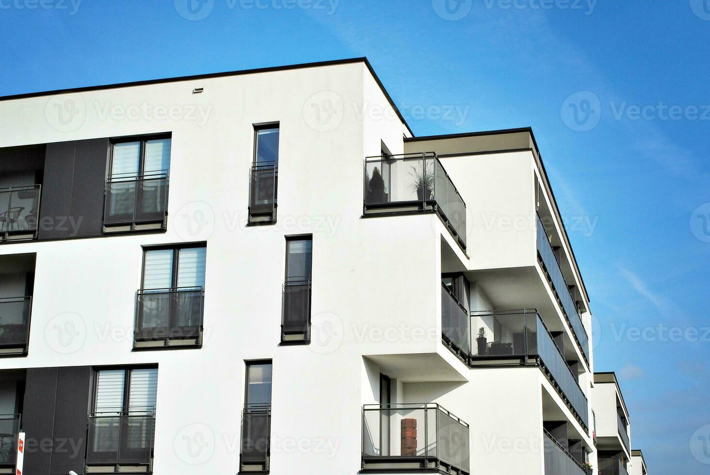 Modern and new apartment building. Multistoried, modern, new and stylish living block of flats. photo