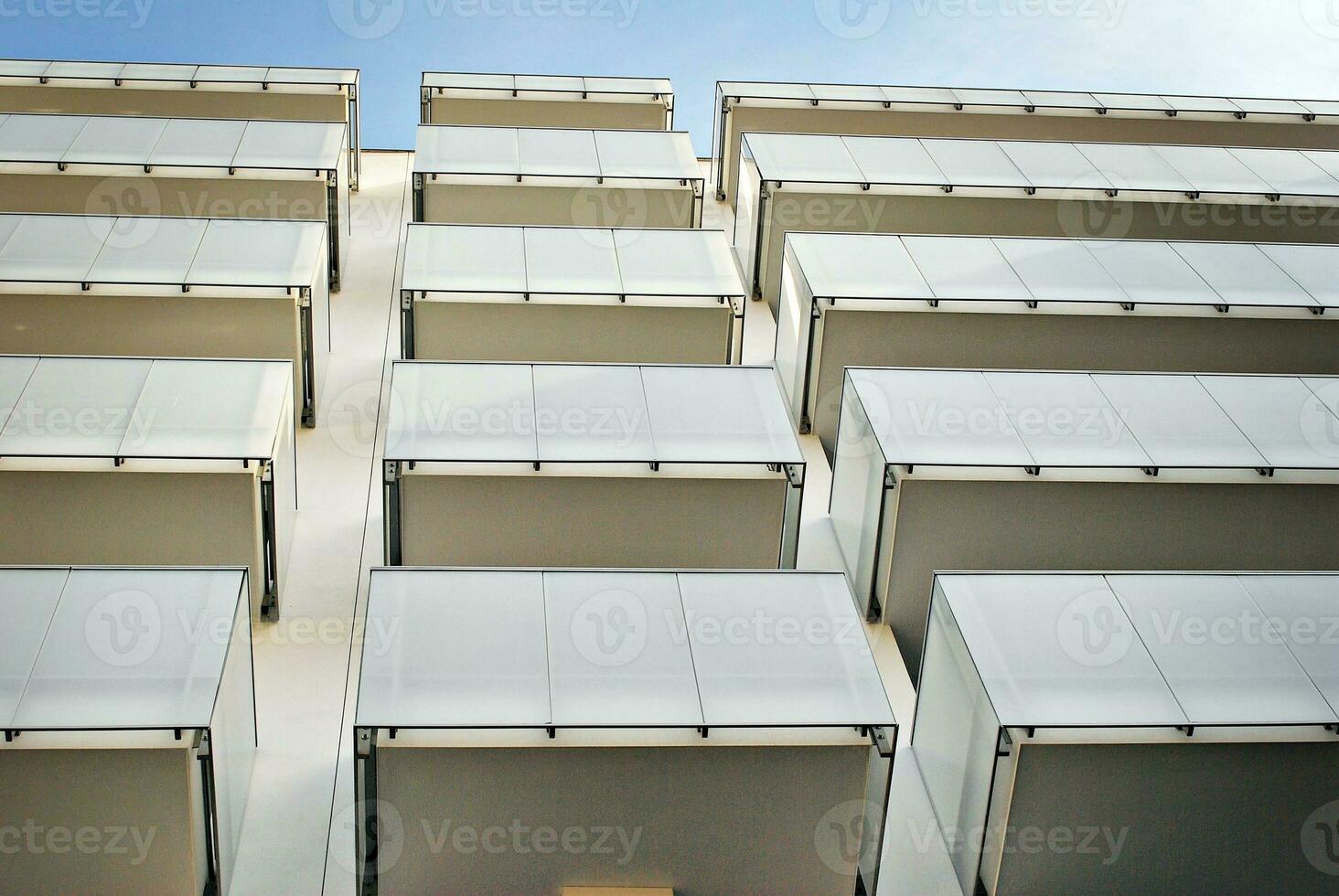 Modern and new apartment building. Multistoried, modern, new and stylish living block of flats. photo