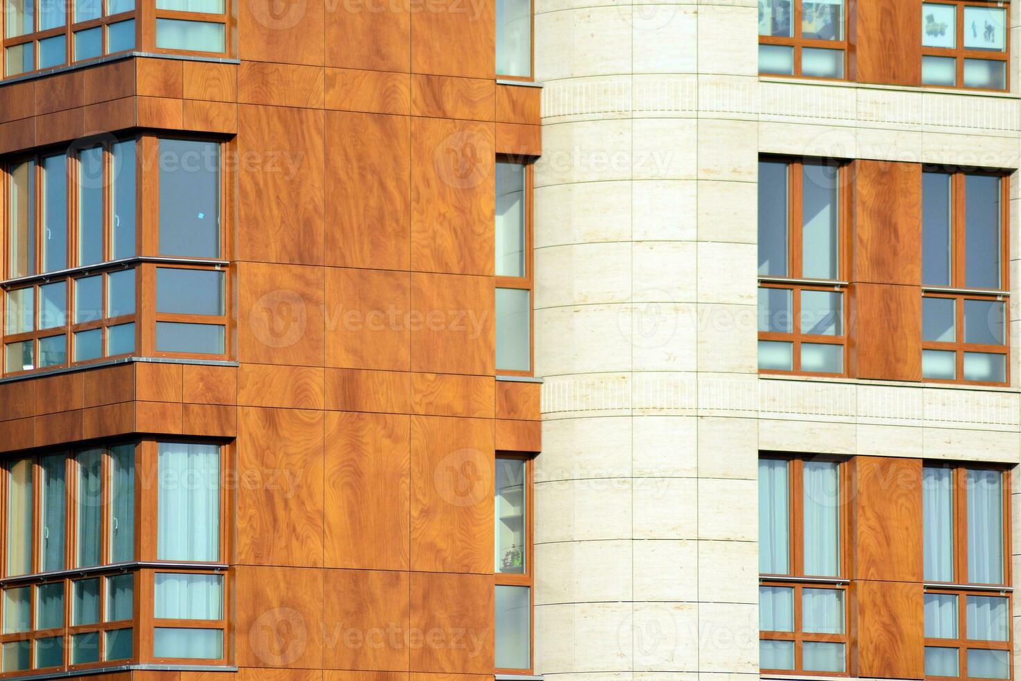 Modern and new apartment building. Multistoried, modern, new and stylish living block of flats. photo
