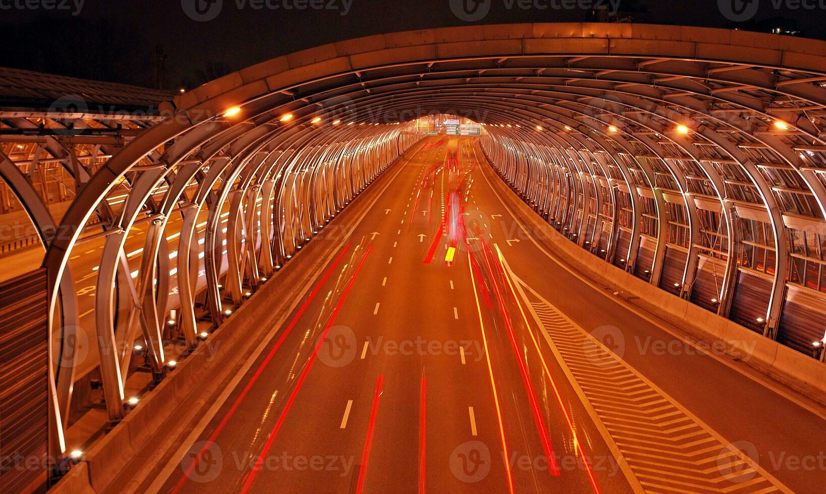 Cars on street. City street lights at night. photo