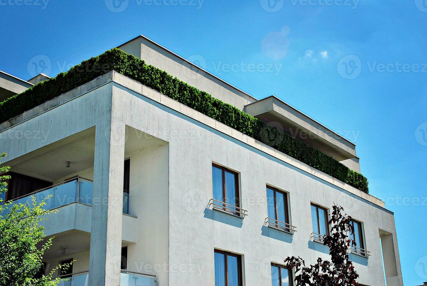 Modern and new apartment building. Multistoried, modern, new and stylish living block of flats. photo