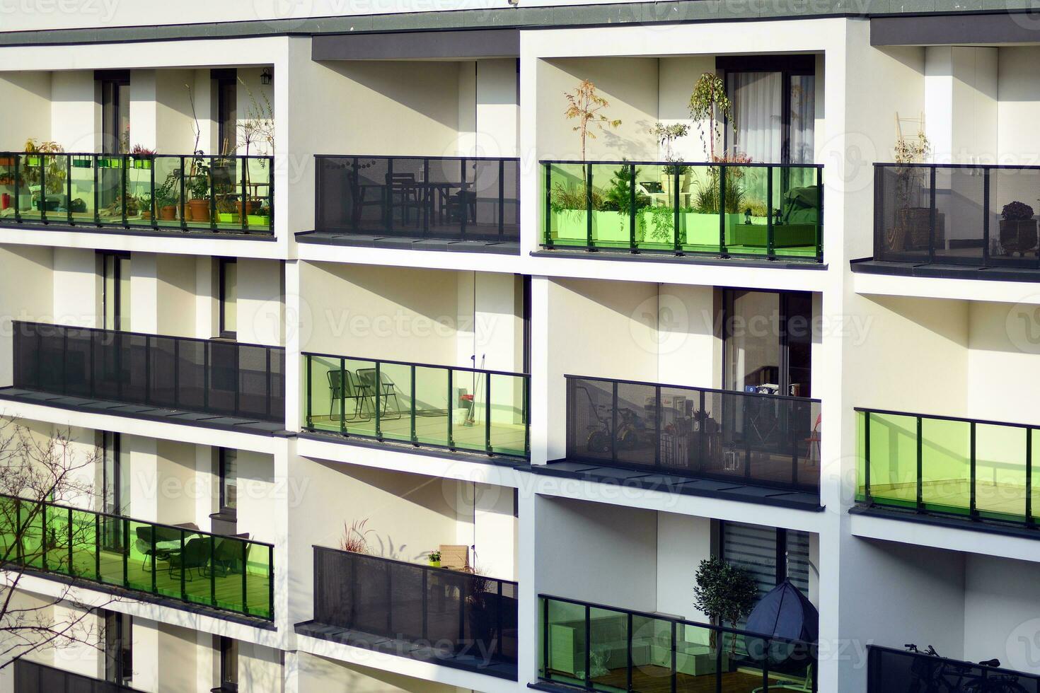Modern and new apartment building. Multistoried, modern, new and stylish living block of flats. photo