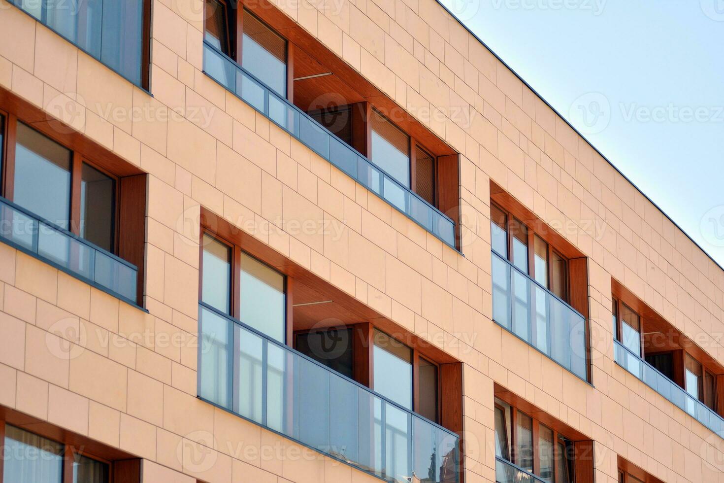 Modern and new apartment building. Multistoried, modern, new and stylish living block of flats. photo