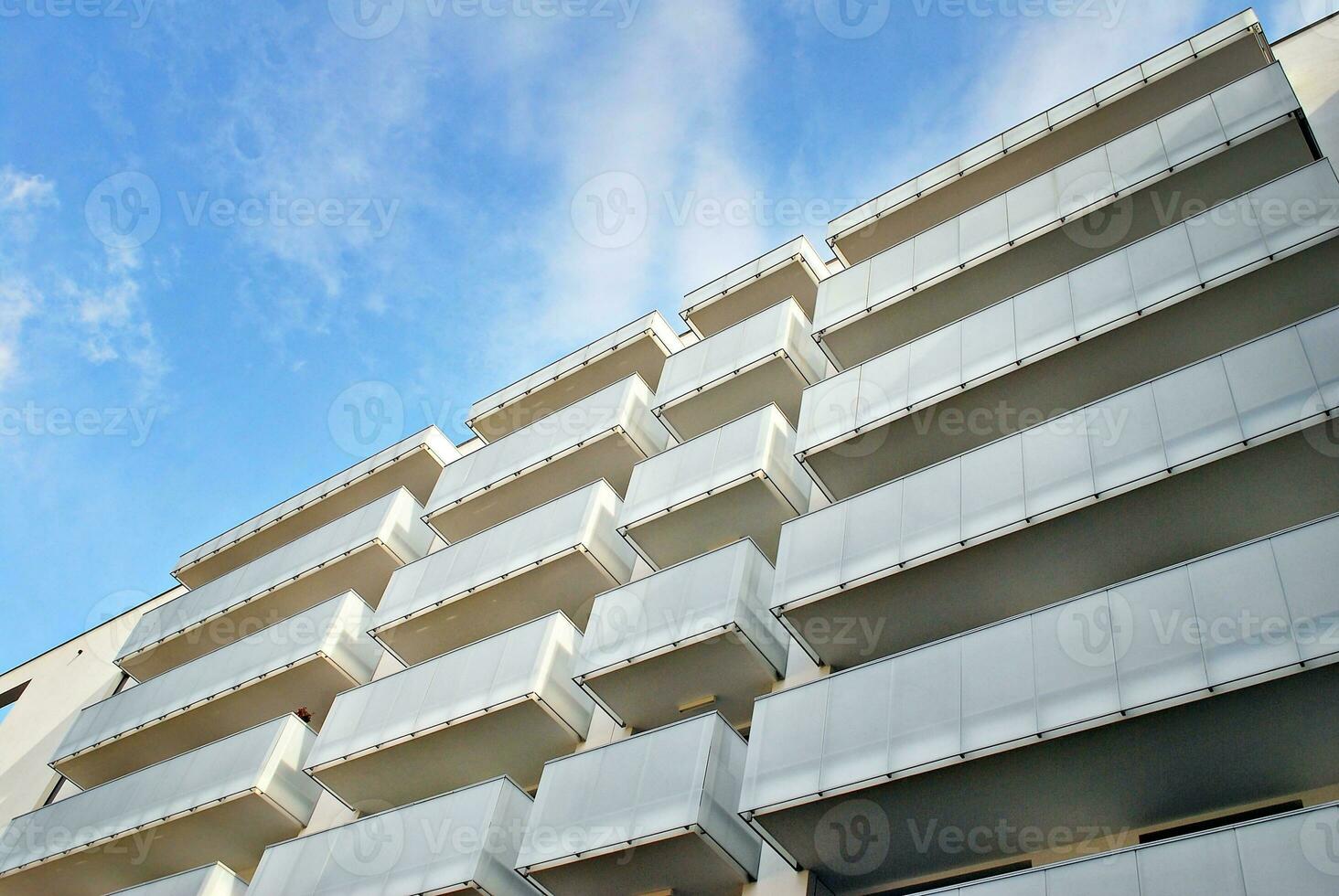 Modern and new apartment building. Multistoried, modern, new and stylish living block of flats. photo