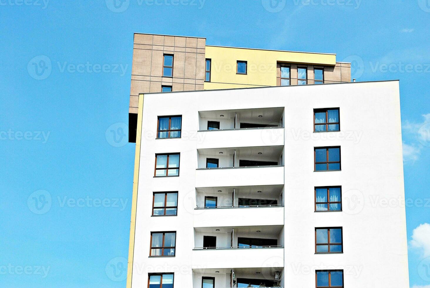 Modern and new apartment building. Multistoried, modern, new and stylish living block of flats. photo