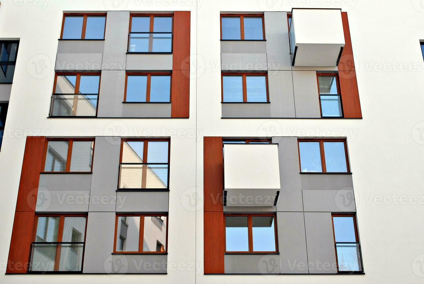 Modern and new apartment building. Multistoried, modern, new and stylish living block of flats. photo