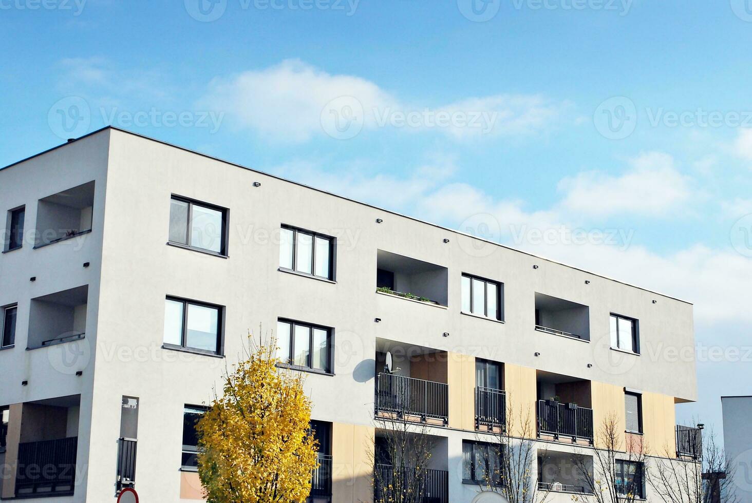 Modern and new apartment building. Multistoried, modern, new and stylish living block of flats. photo