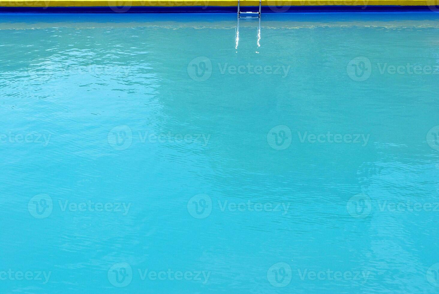 Blue ripped water in swimming pool photo