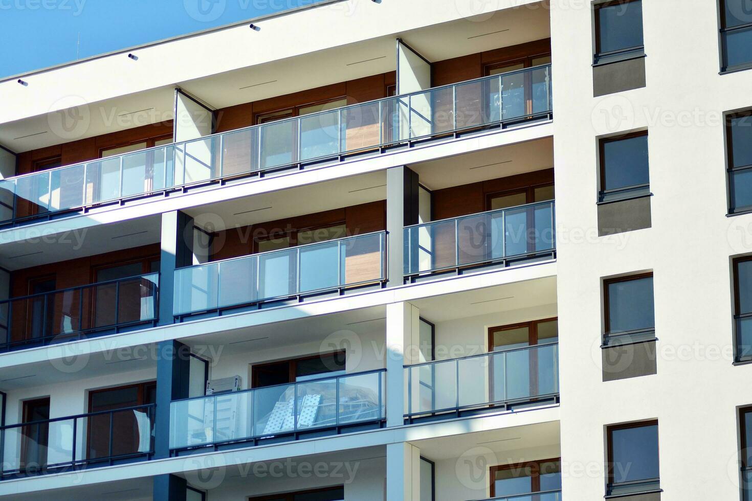 Modern and new apartment building. Multistoried, modern, new and stylish living block of flats. photo
