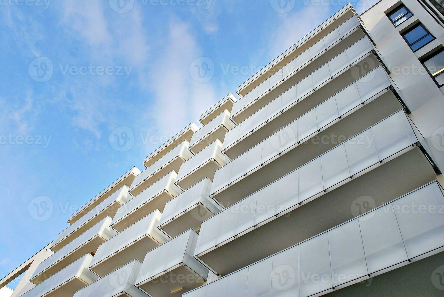 Modern and new apartment building. Multistoried, modern, new and stylish living block of flats. photo
