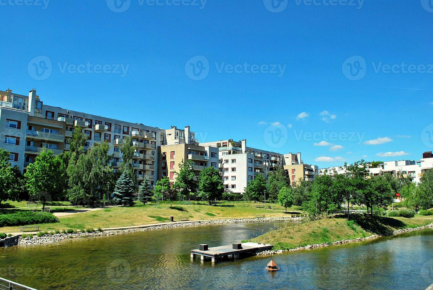 Modern and new apartment building. Multistoried, modern, new and stylish living block of flats. photo