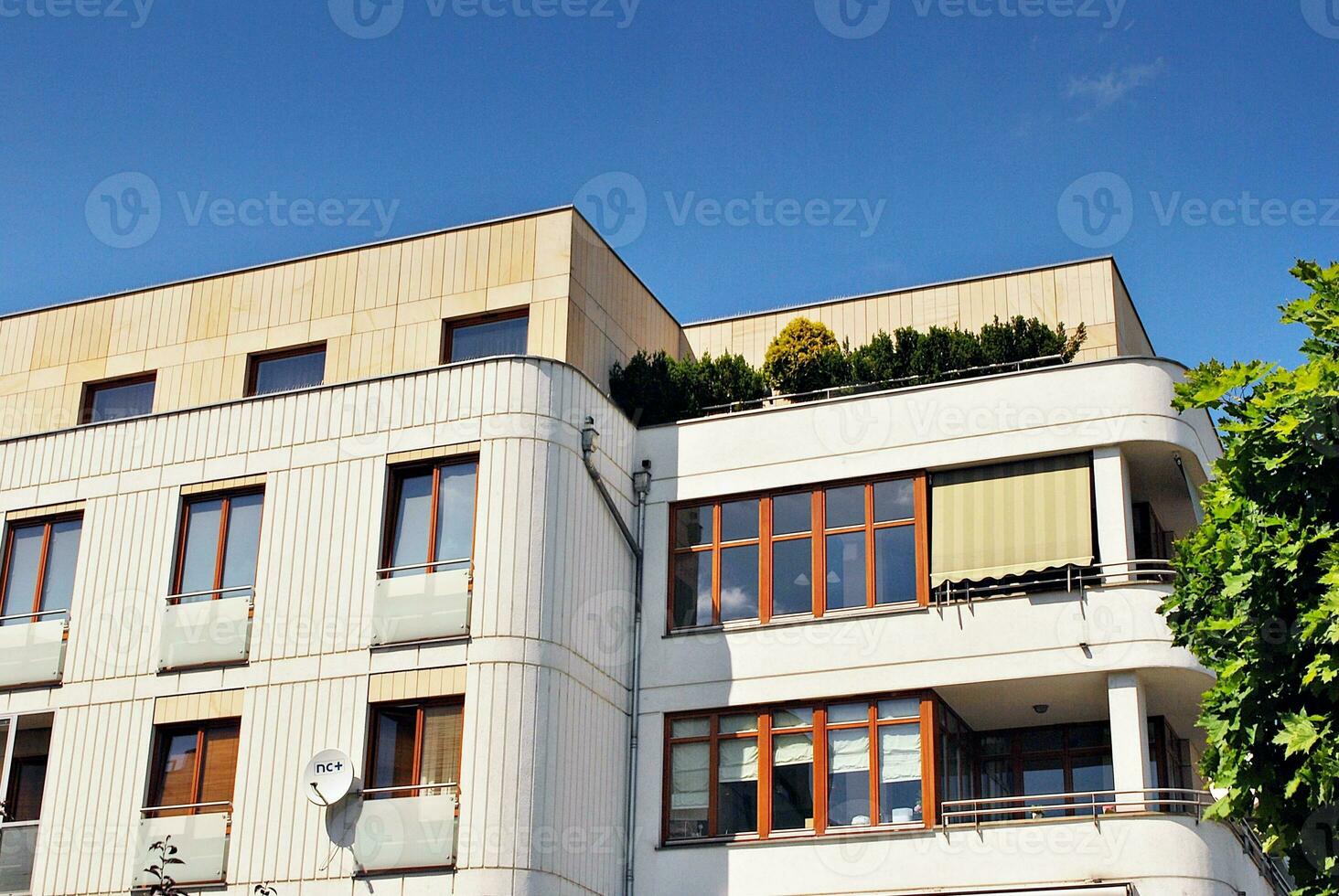 Modern and new apartment building. Multistoried, modern, new and stylish living block of flats. photo