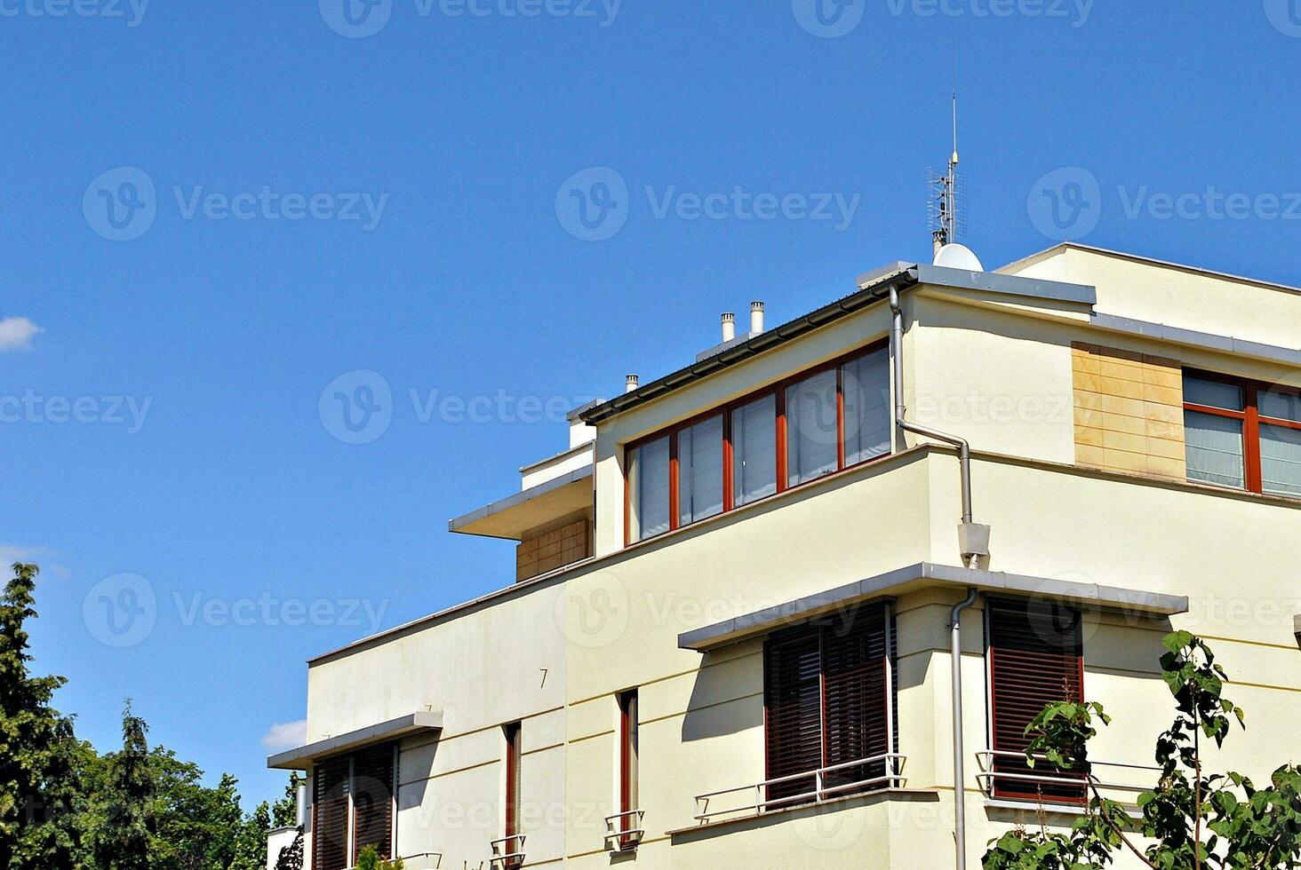 Modern and new apartment building. Multistoried, modern, new and stylish living block of flats. photo