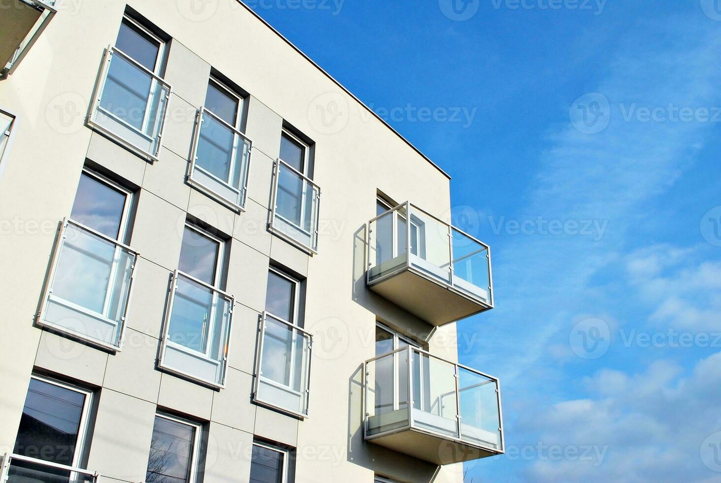 Modern and new apartment building. Multistoried, modern, new and stylish living block of flats. photo