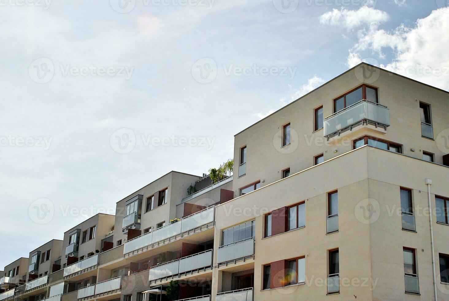 Modern and new apartment building. Multistoried, modern, new and stylish living block of flats. photo