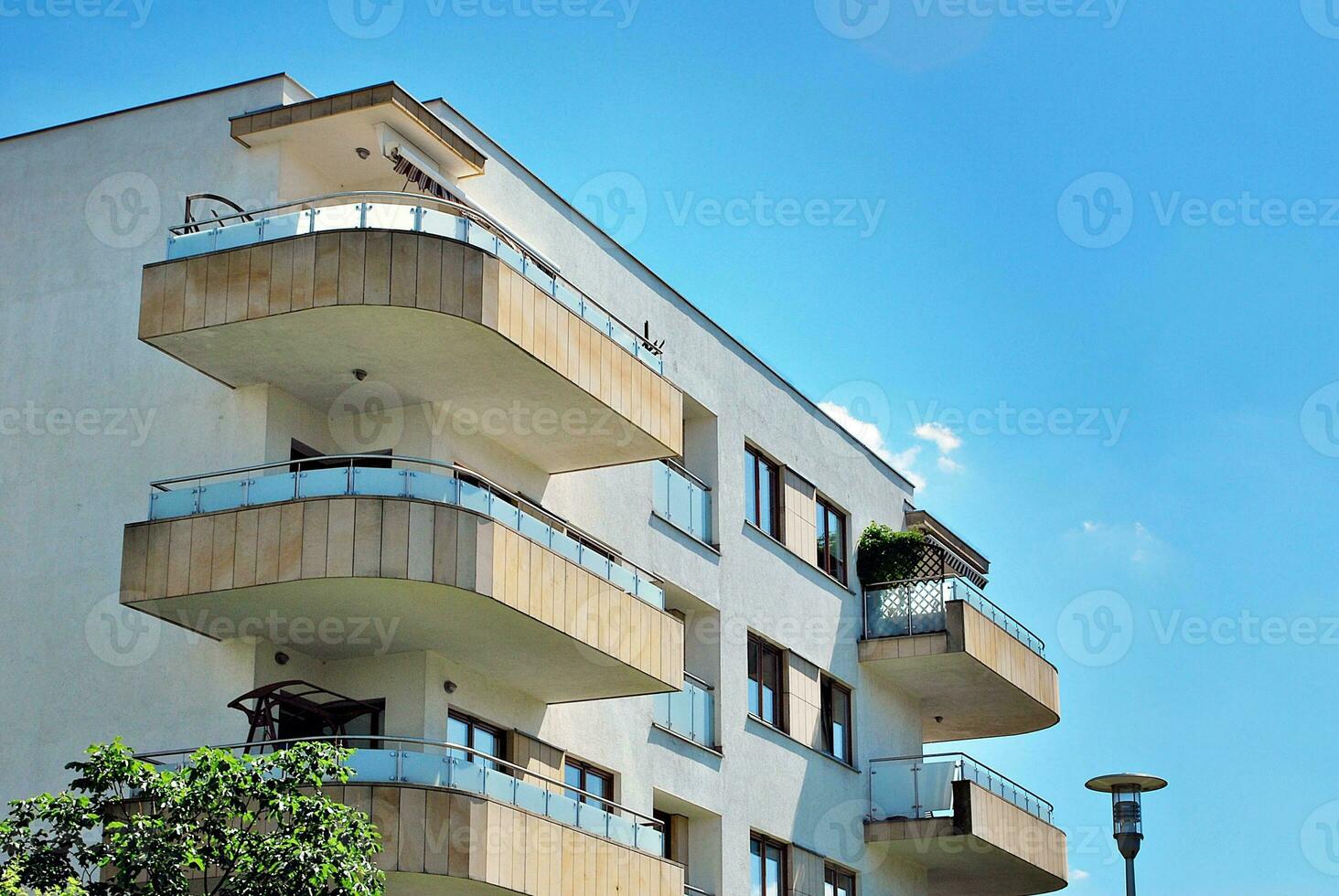 Modern and new apartment building. Multistoried, modern, new and stylish living block of flats. photo