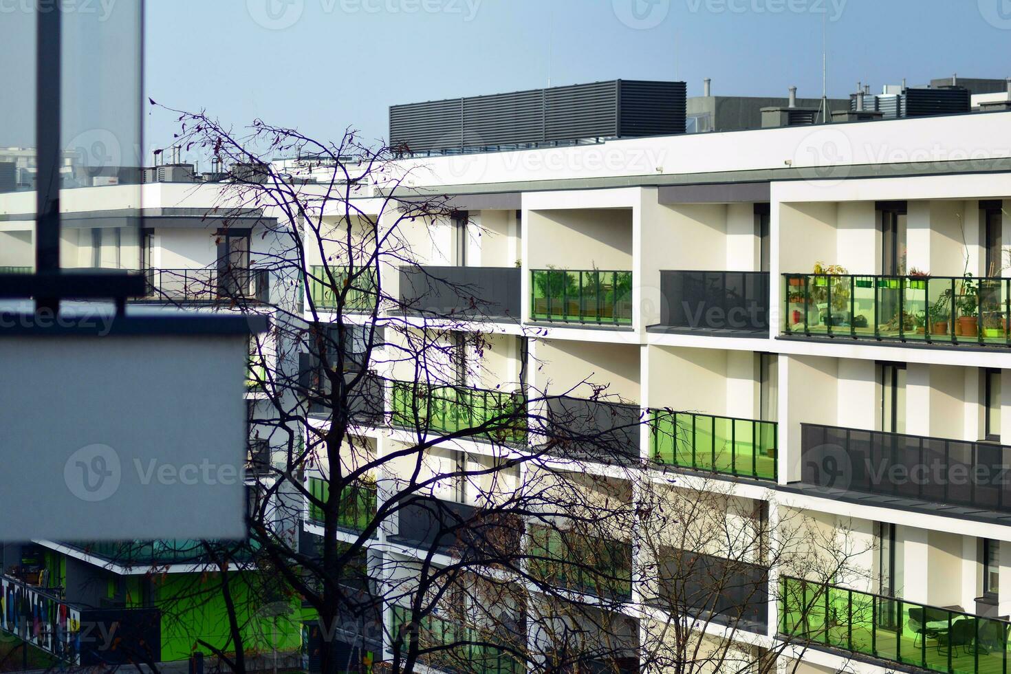 Modern and new apartment building. Multistoried, modern, new and stylish living block of flats. photo