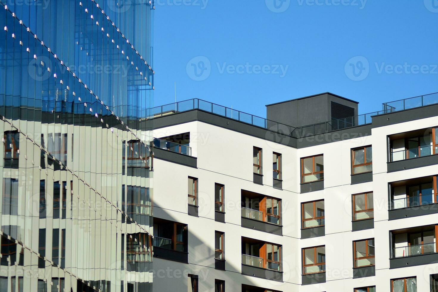 Modern and new apartment building. Multistoried, modern, new and stylish living block of flats. photo