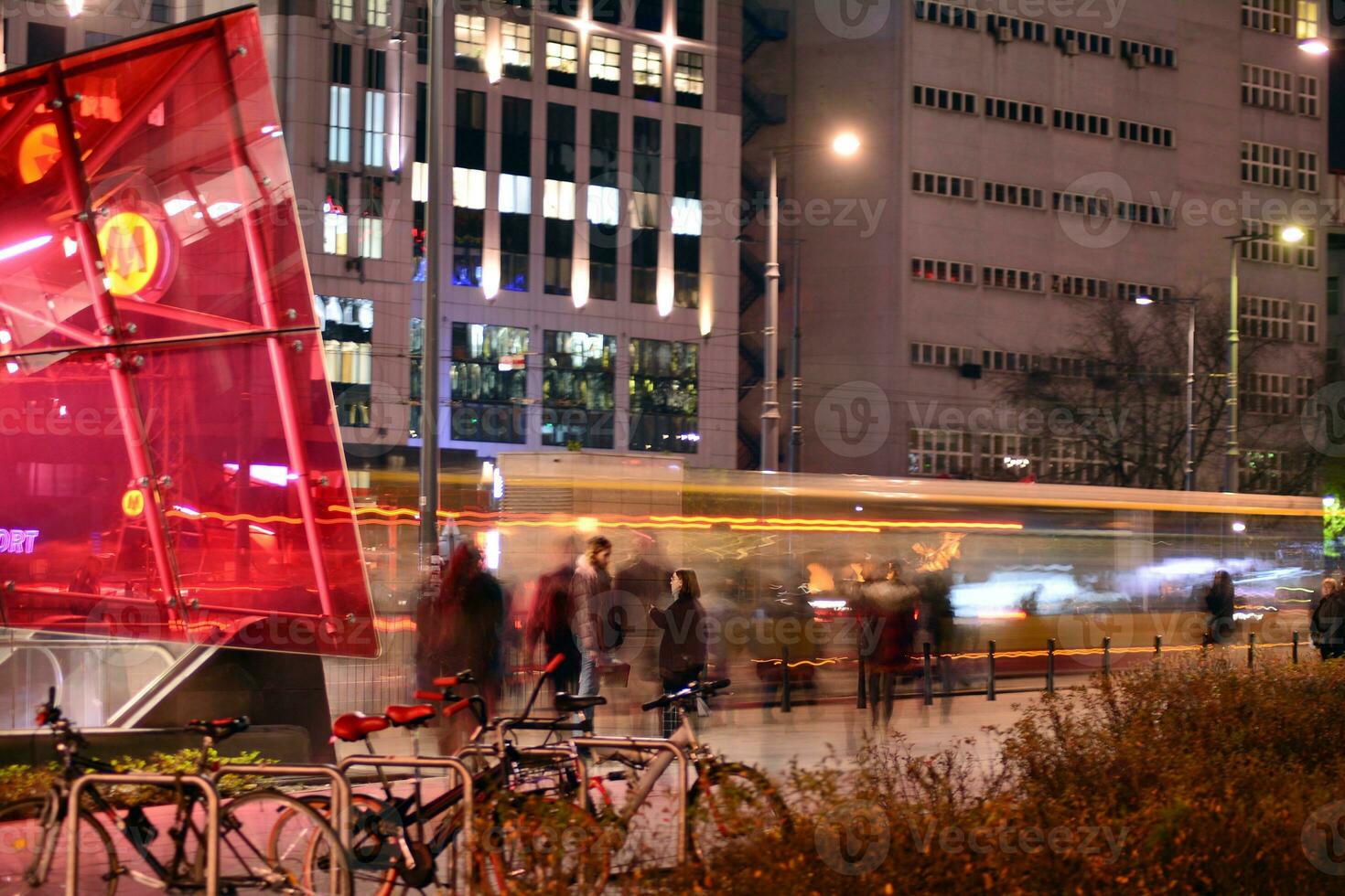 Roving car with blur light through city at night photo