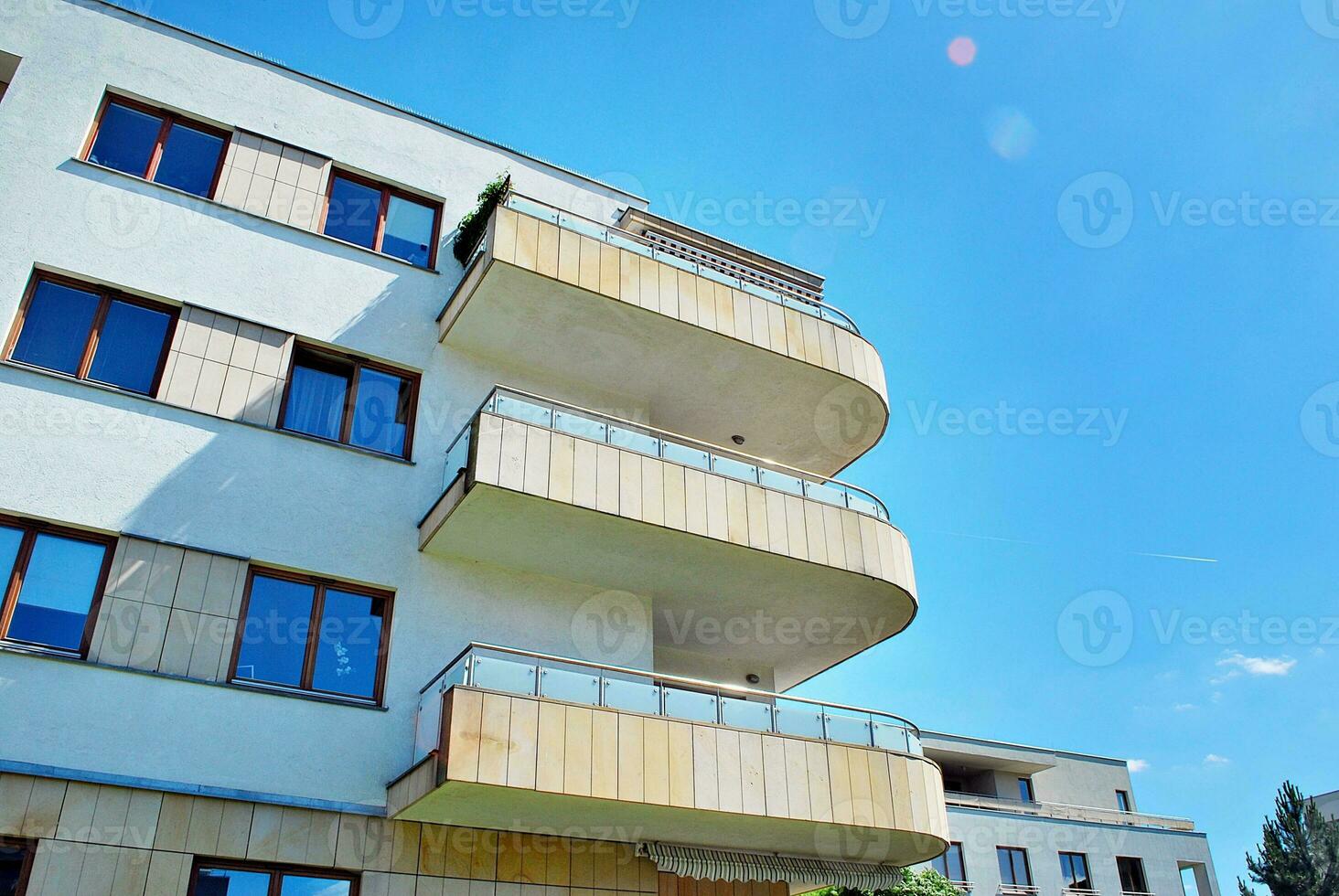 Modern and new apartment building. Multistoried, modern, new and stylish living block of flats. photo